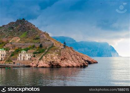 Mountains in the Balaklava Bay in Crimea, dramatic sky above the sea and mountains