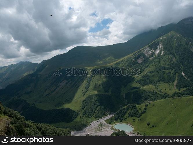 Mountains landscape with green hills and sky for travel and hiking