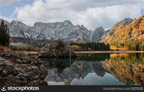 Mountains panorama. Alpine landscape with lake. Lake of Fusine,Tarvisio,Italy.