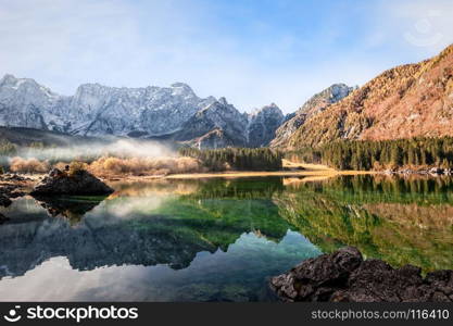 Mountains panorama. Alpine landscape with lake. Lake of Fusine,Tarvisio,Italy.