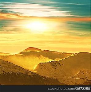 Mountains peak on sunrise