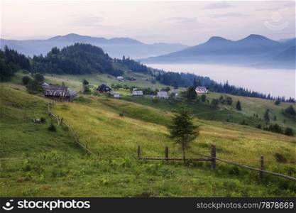 Mountains rural landscape before sunrise. Carpathian mountains, Ukraine