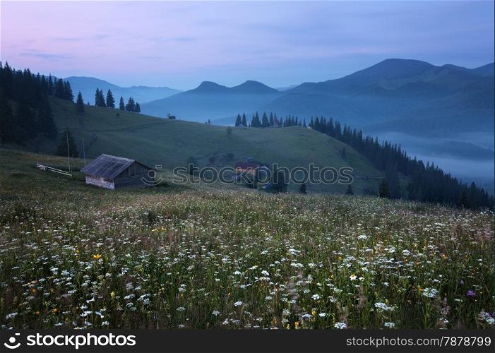 Mountains rural landscape before sunrise. Carpathian mountains, Ukraine