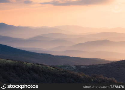 Mountains silhouette at sunrise