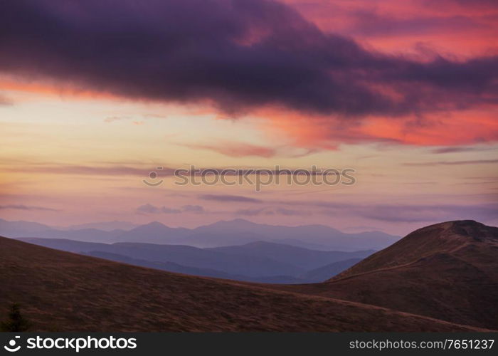 Mountains silhouette at sunrise. Beautiful natural background.