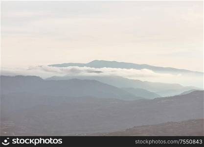 Mountains silhouette in Cyprus in the misty morning