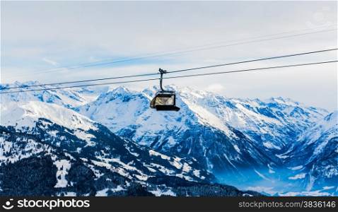Mountains ski resort. Cable car. Winter in the swiss alps. mountain lift (funicular)