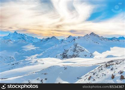 Mountains with snow peaks. Mountains with snow peaks and sunset sky