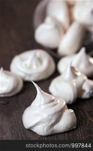 mouth-watering meringue on a wooden background