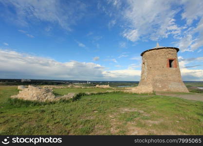 Movement of clouds over the Tower of ancient Bulgar fortress on a high cliff on the banks of the Kama River, Elabuga, Republic of Tatarstan, Russia