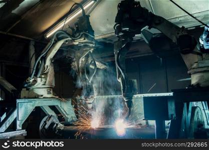 movement of robot welding in factory