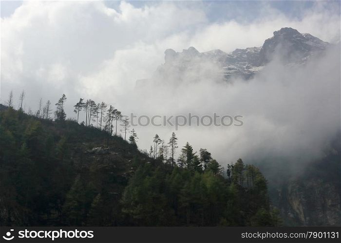 Movement of the clouds on the mountains, Himalayas, Nepal.