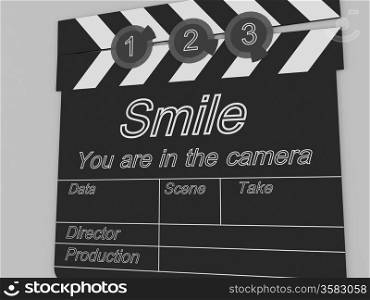 Movie production clapper board notifying to the people that smile you are in the camera