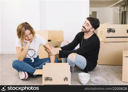 moving concept with bored couple