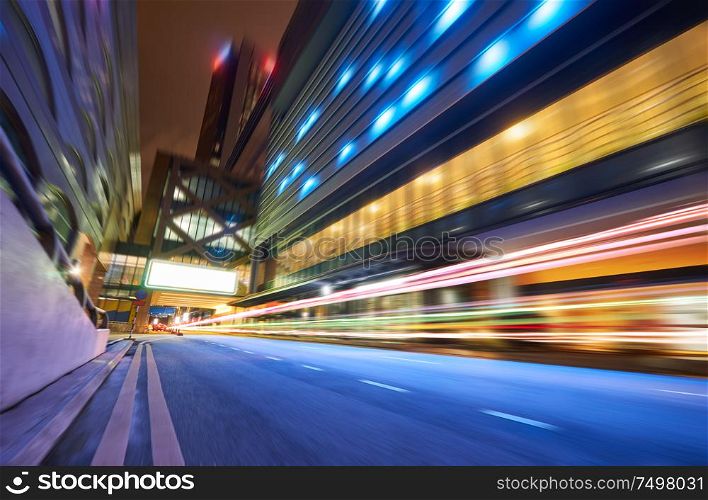 Moving forward motion blur background with light trails ,night scene .