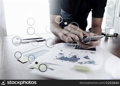 Moving Image of Business creative designer working with smart phone and tablet computer blank flow chart at office as concept