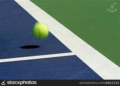 moving tennis ball at the corner of court