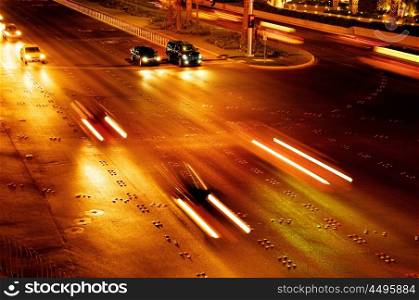 Moving traffic and car lights in the evening