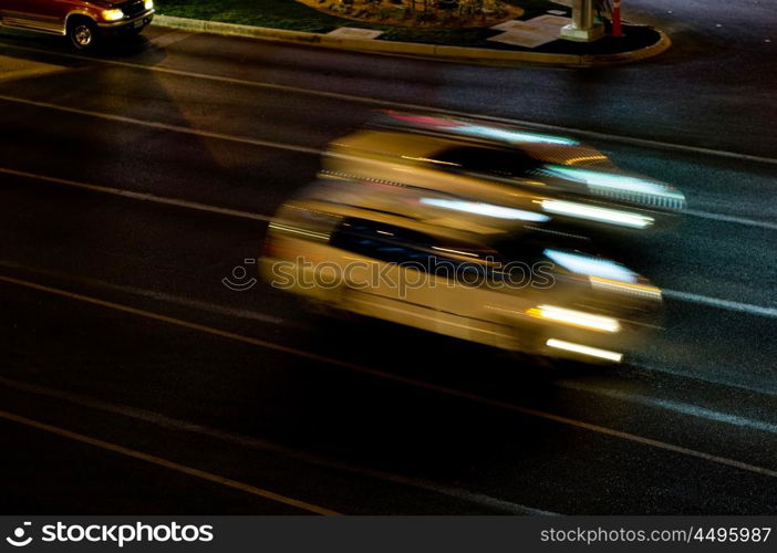 Moving traffic and car lights in the evening