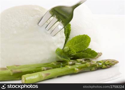mozzarella and asparagus. photo of a fresh mozzarella bufala and asparagus