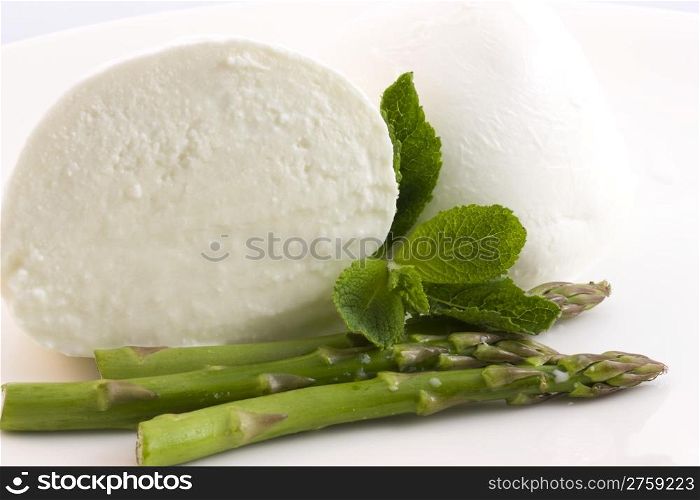 mozzarella bufala and asparagus. photo of a tasty mozzarella bufala and asparagus