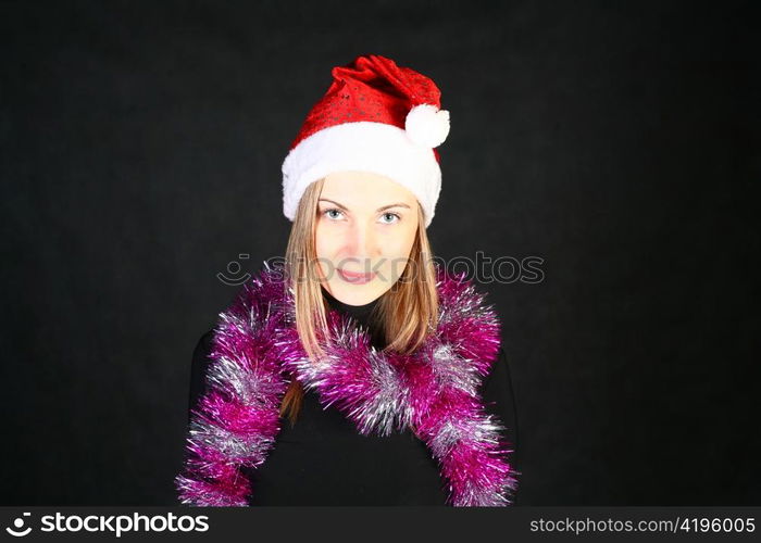 Mrs. Santa dreaming about Christmas on dark background