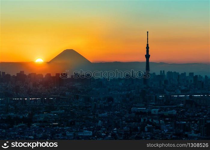 Mt Fuji and Tokyo Sky Tree in Sunset, Tokyo City, Japan. Urban scene, nature combination. Fuji Mountain view from Tokyo. Skyline of Skytree and Fuji Japan. Tokyo Cityscape with mount Fuji background.