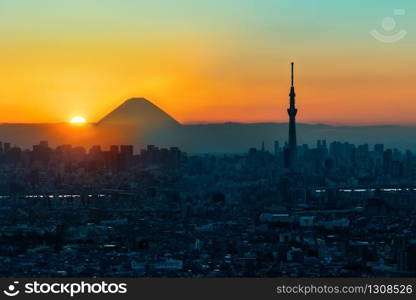 Mt Fuji and Tokyo Sky Tree in Sunset, Tokyo City, Japan. Urban scene, nature combination. Fuji Mountain view from Tokyo. Skyline of Skytree and Fuji Japan. Tokyo Cityscape with mount Fuji background.