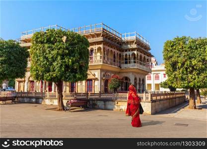 Mubarak Mahal City Palace and an Indian woman, Jaipur, India.. Mubarak Mahal City Palace and an Indian woman, Jaipur, India