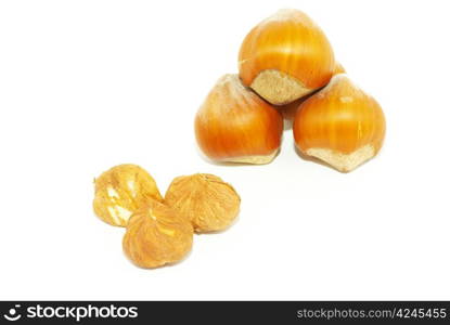 Much hazelnuts isolated on white