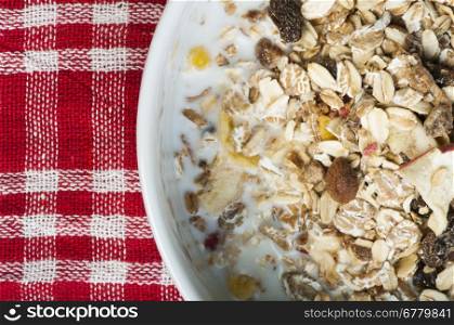 Muesli breakfast in a bowl close up