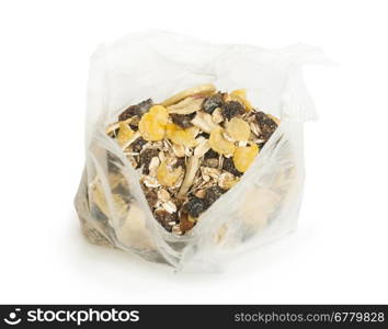 Muesli breakfast in transparent package. White isolated