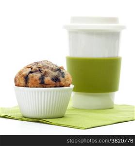 Muffin with coffee mug on white background