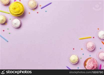 muffins candles aalaw sprinkles corner pink background. Resolution and high quality beautiful photo. muffins candles aalaw sprinkles corner pink background. High quality beautiful photo concept