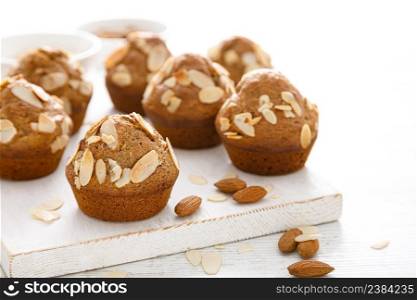 Muffins with flaked almond nuts. Cupcakes with nut chips