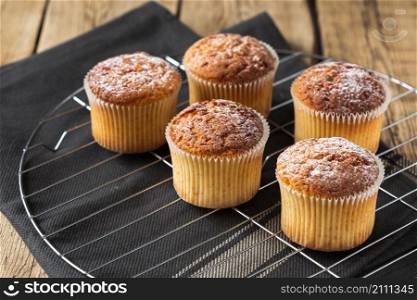 muffins with powdered sugar tray