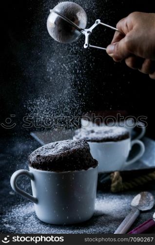 Mug cake on a black background