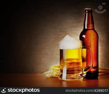 Mug of beer and a bottle with spikelets