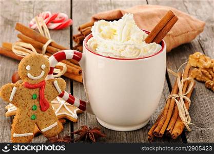 Mug of hot chocolate on wooden table