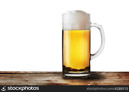 Mug of lager beer on wooden rack isolated on white background