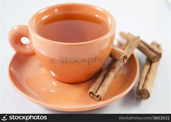 Mug of Red tea with cinnamon