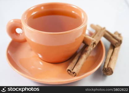 Mug of Red tea with cinnamon