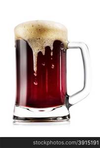 Mug thick dark beer with foam isolated on white background. Mug thick dark beer with foam