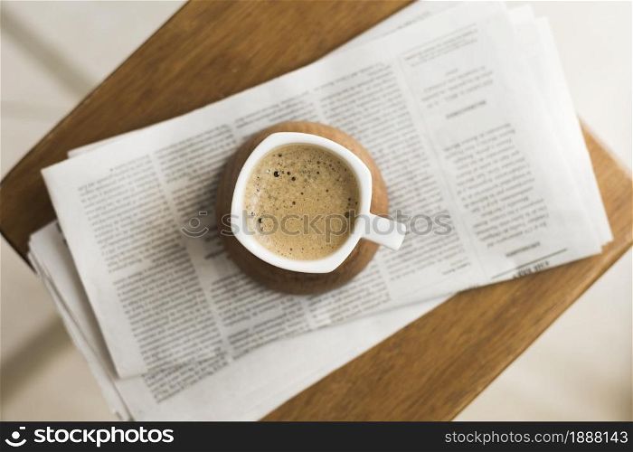 mug with hot coffee newspapers . Resolution and high quality beautiful photo. mug with hot coffee newspapers . High quality and resolution beautiful photo concept
