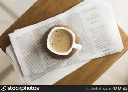 mug with hot coffee newspapers . Resolution and high quality beautiful photo. mug with hot coffee newspapers . High quality and resolution beautiful photo concept