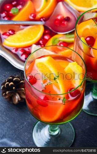 Mulled wine drink. Winter mulled wine with orange,cranberry and spices