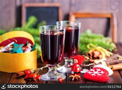 mulled wine in glass and on a table