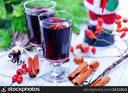 mulled wine in glass and on a table