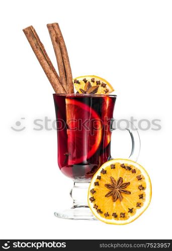 Mulled wine with orange, cinnamon sticks, anise isolated on white background