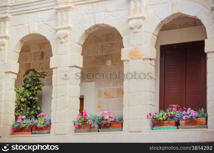 mullioned window with flowers